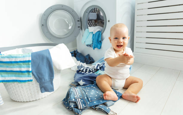 Quần áo sơ sinh nên giặt tay hay giặt máy?